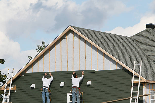 Professional Siding technician working in Martins Ferry, OH